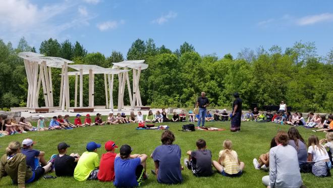 Photo for people listening to Elder speak at the Awen Gathering Place Photo for people listening to Elder speak at the Awen Gathering Place