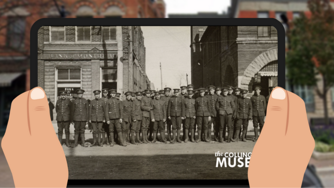 Two hands hold an iPad that features a photograph of WWI soldiers