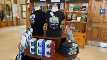 Items in the Museum gift shop. Tshirts, mugs and books.