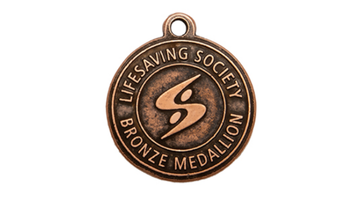 Bronze Lifesaving Society medallion for Bronze Medallion certification.